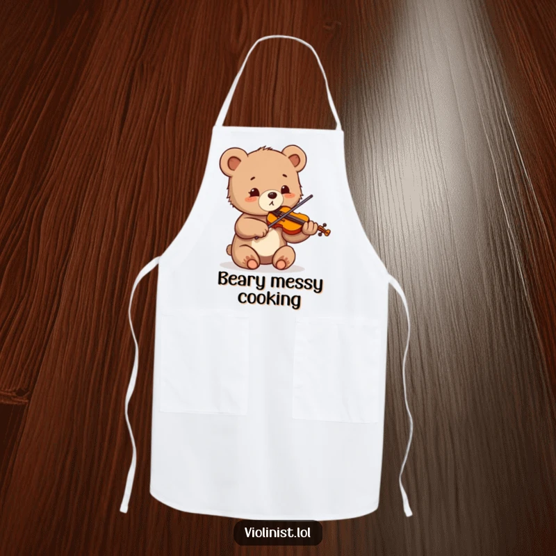 Funny apron showing a small bear cub sawing its violin with big eyes full of pure delight and excitement.