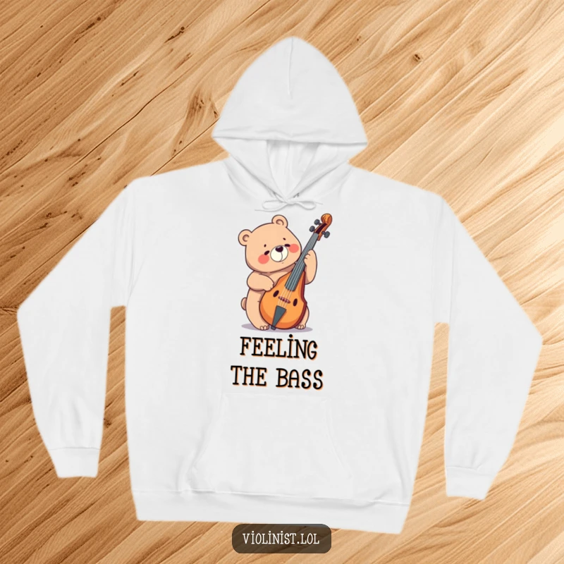 Funny bear playing a giant cello with a joyful expression, depicted on a cozy hoodie for ultimate comfort.