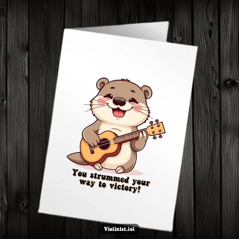 Funny Free Printable Congratulations Card: Playful otter strumming a ukulele with a wide grin, celebrating a joyous occasion.