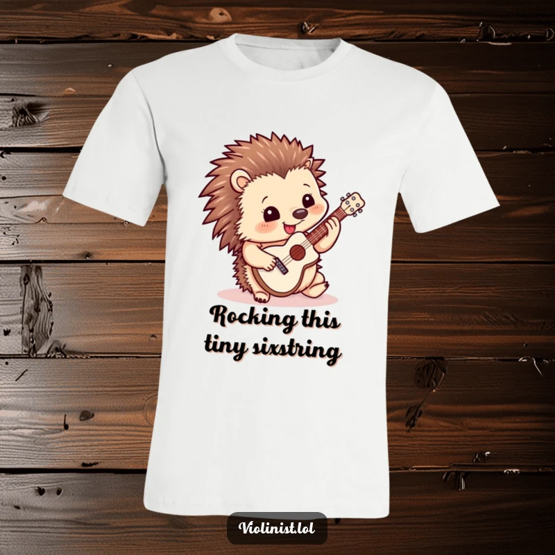 Funny t-shirt print of a cheerful hedgehog playing a miniature guitar, embodying a tiny, adorable rockstar.